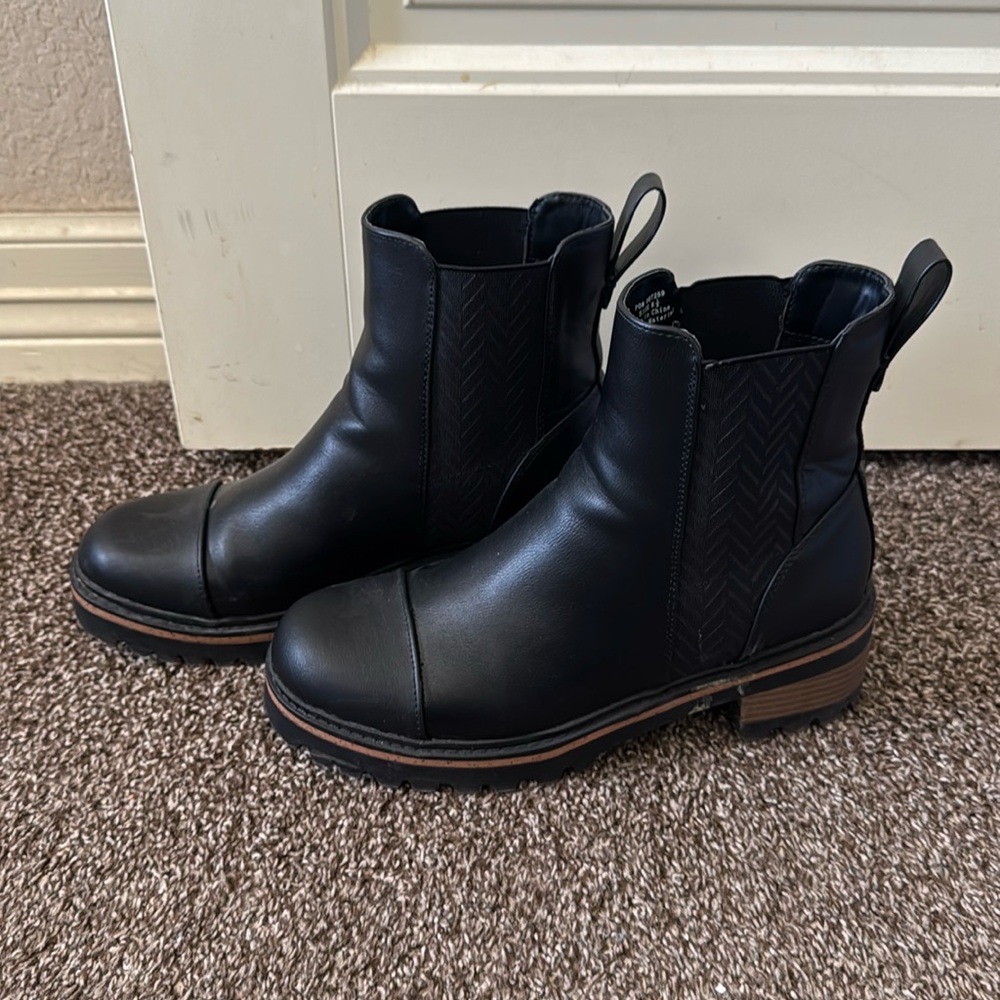 Black Chelsea boots.
